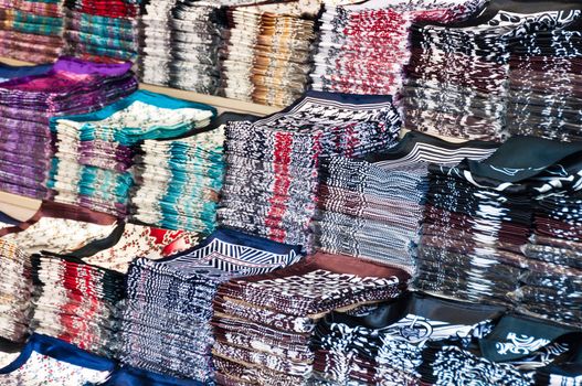 Large amount of cloths on stacks at wholesale store in Istanbul, Turkey