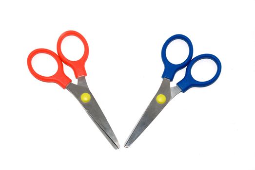 Red and dark blue scissors isolated on a white background