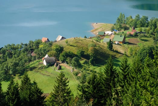 Beautiful village on the lake in mountain. Fisherman village