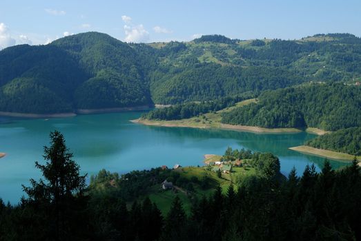 village on the beautiful  lake in mountain. fisherman dream