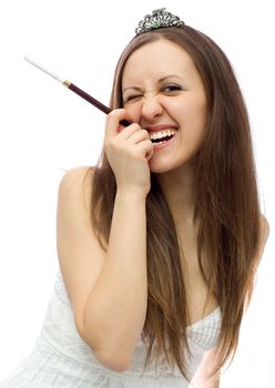 grimacing young girl with hairgrip and cigarette holder