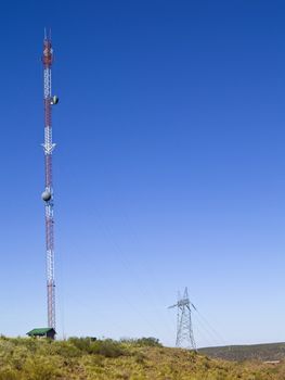 Cellular communication antenna on a blue sky background.