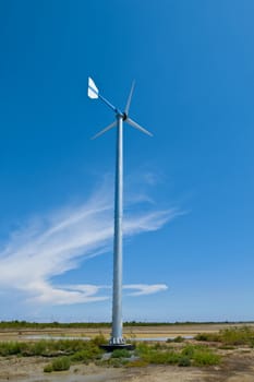 Wind generator at salt farm in samuthsongkram,thailand