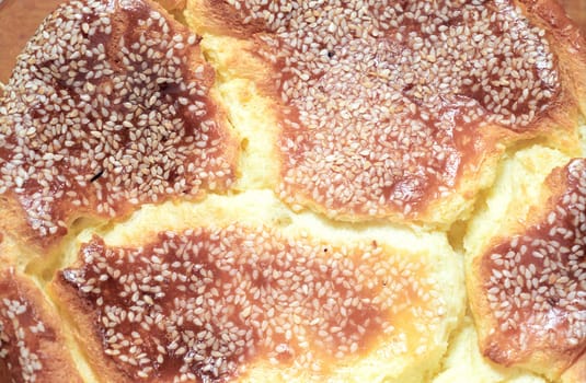Cheese piecrust with sesame seeds as a culinary background