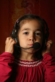 Smiling child wearing headset