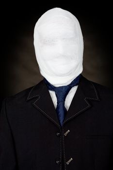Man in bandage and the cravat on black