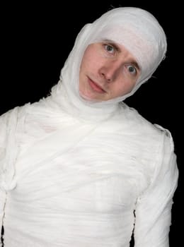 Man in bandage on the black background