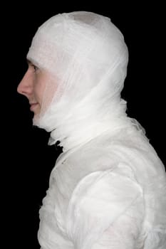 Man in bandage on the black background