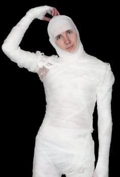 Man in bandage on the black background