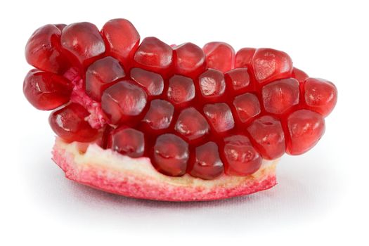 Red ripe pomegranate on a white background