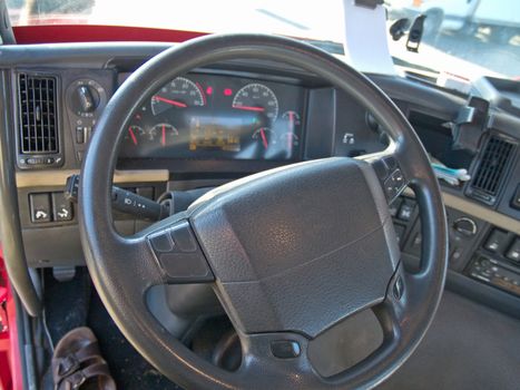 Steering wheel and instrument panel of a  truck