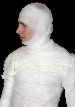 Man in bandage on the black background