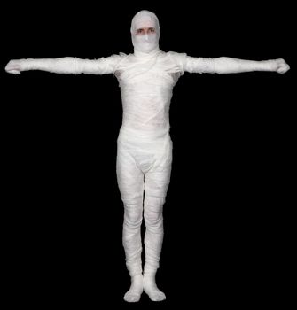 Bandaged young man upright on black background