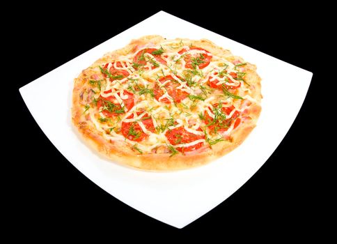 round pizza on square plate, isolated over black background