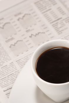 Early morning financial news with a cup of coffe