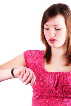 Teenage girl looking on her watch, isolated on white.