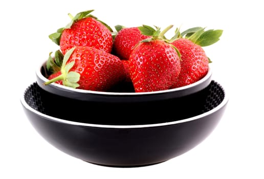 Bowl full of nice ripe strawberries isolated on white.                 