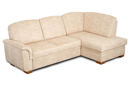 A sofa in a light fabric is isolated on a white background.
