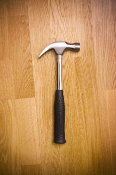 hammer on hardwood floor