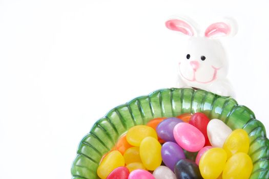 Candy dish of an Easter Bunny full of Jelly beans isolated on a white background with copy space.