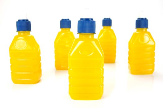 Pop top juice bottles isolated against a white background
