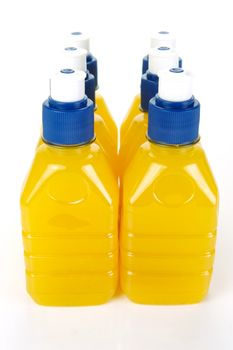 Pop top juice bottles isolated against a white background