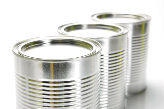 Tin cannisters isolated against a white background