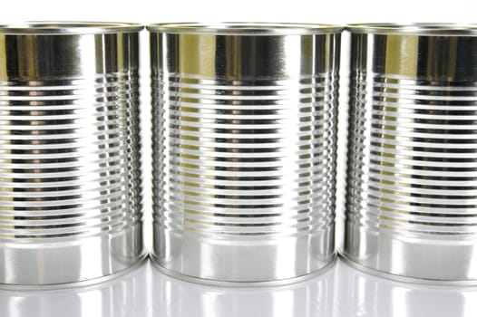Tin cannisters isolated against a white background