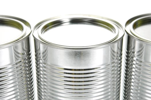 Tin cannisters isolated against a white background