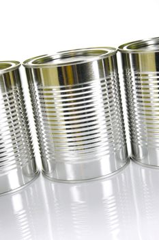 Tin cannisters isolated against a white background