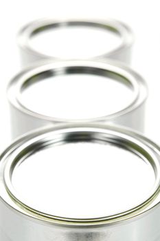 Tin cannisters isolated against a white background