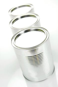 Tin cannisters isolated against a white background