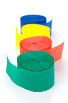 Colored streamers isolated against a white background