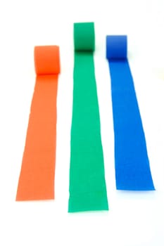 Colored streamers isolated against a white background