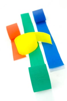 Colored streamers isolated against a white background