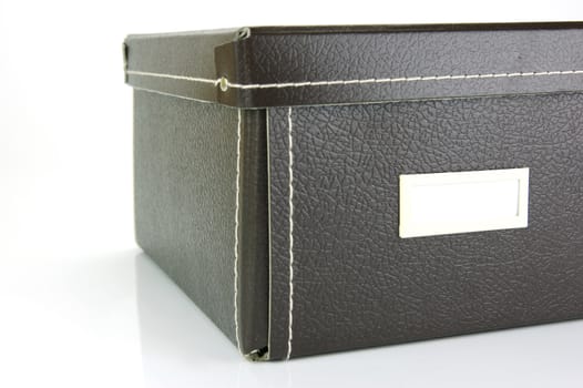 Brown stationery boxes isolated against a white background