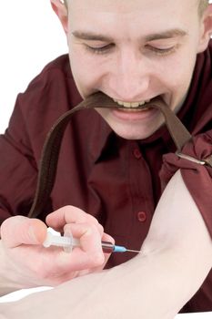 Young man to give an injection himself on white