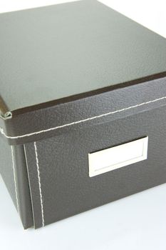 Brown stationery boxes isolated against a white background