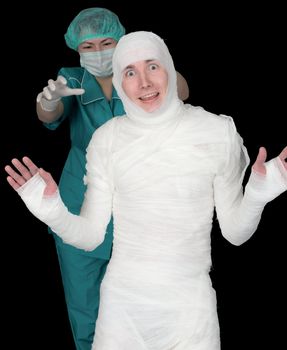 Man in bandage and nurse on black background.