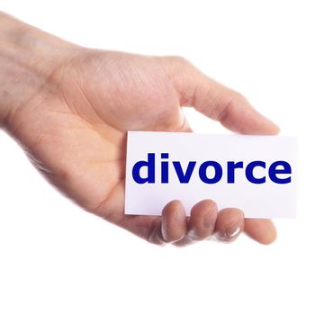 divorce concept with hand holding paper sign