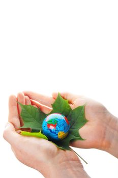 hand holding globe showing ecology or nature concept
