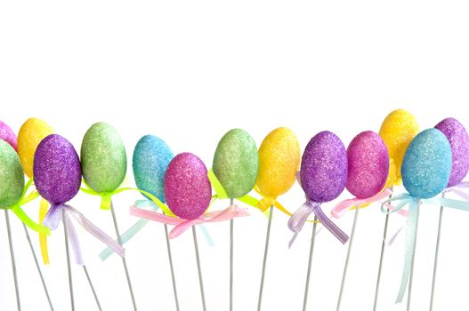 Cute Easter toy eggs isolated on white background