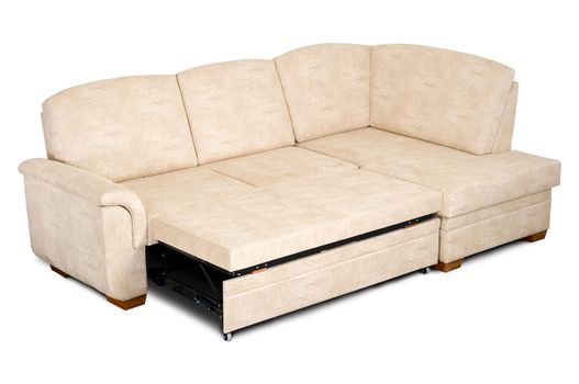 Open bright fabric sofa isolated on a white dackground.