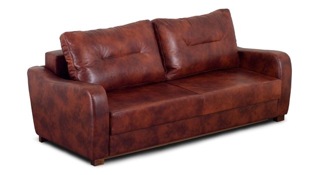 A small leather sofa with pillow isolated on a white background.