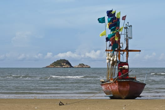 small fishing boat on Hua Hin beach,thailand