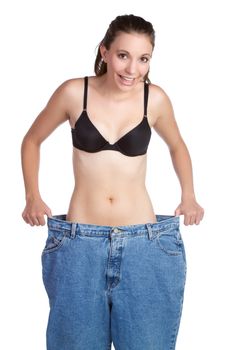 Weight loss woman holding pants