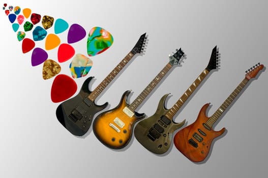 isolated four guitars