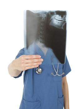 Nurse with her face hidden by an x-ray image.