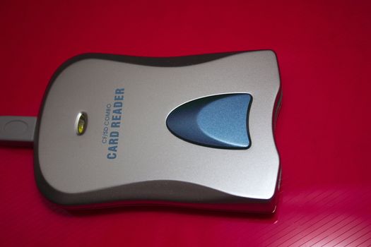 duel format card reader over a red background