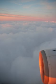 Setting sun shining on aircraft engine